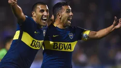 JUNTOS. Wanchope Ábila y Carlos Tevez celebran un gol de Boca.