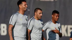 PREPARADOS. Edwin Cardona, Wanchope Ábila y Wilmar Barrios en el entrenamiento en Barcelona.