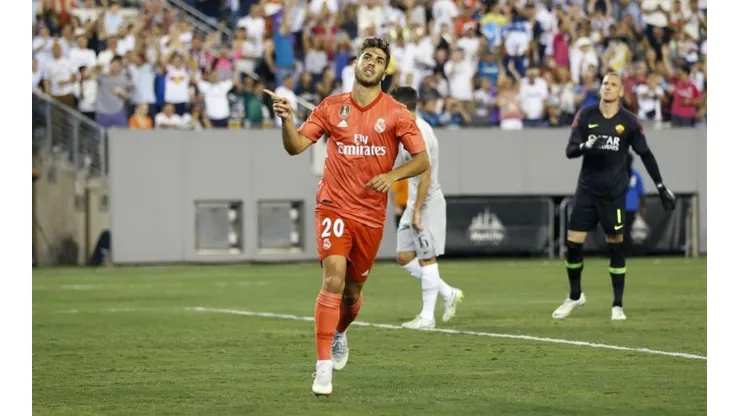 EL GOLEADOR. Marco Asensio celebra el 1-0 ante Roma con Real Madrid.