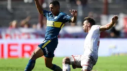 TRABA EN EL MEDIO. Agustín Almendra contra Huracán en la última jornada de la Superliga (Foto: Getty).