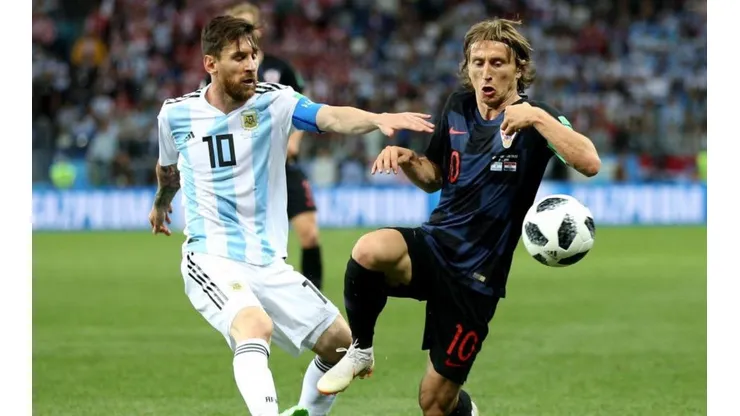 Lionel Messi y Luka Modric durante el partido.