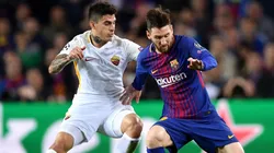 Foto de Diego Perotti junto a Lionel Messi.