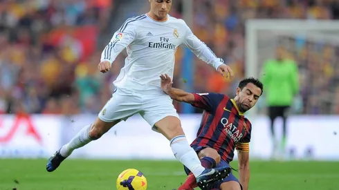 Xavi en un clásico frente al Madrid