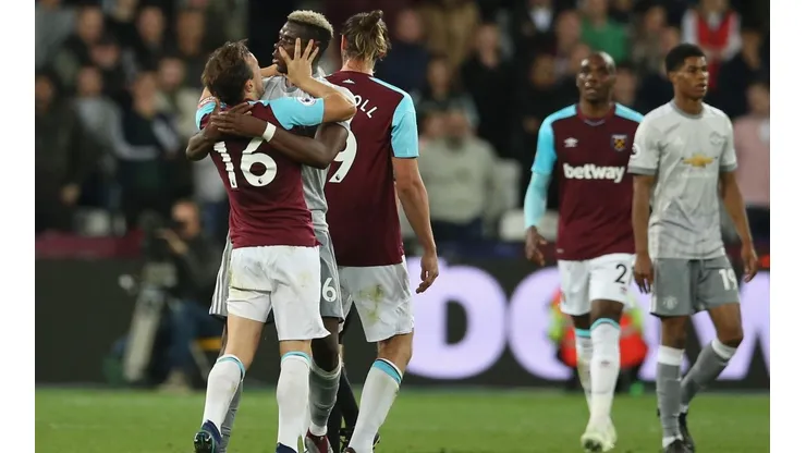 CARA A CARA. Mark Noble y Paul Pogba a los golpes en West Ham-Manchester United (Foto: Getty).