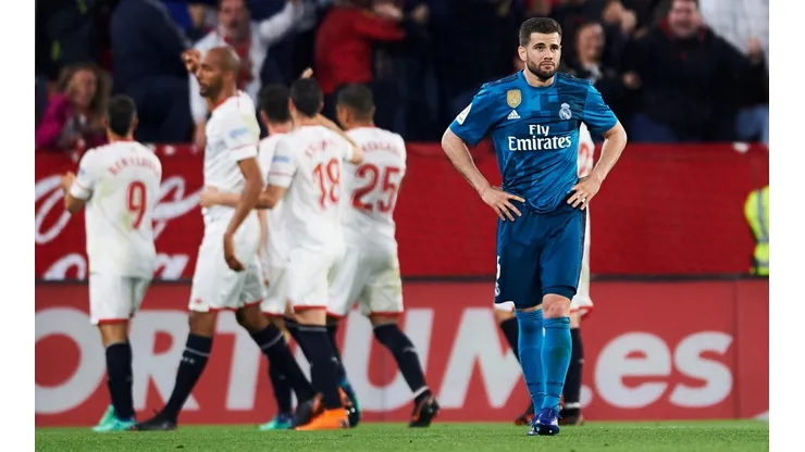 TRES PUNTOS PERDIDOS. La frustración ante Nacho y de fondo la celebración del Sevilla (Foto: Getty).
