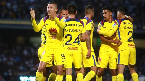 Los jugadores de América celebrando en CU.
