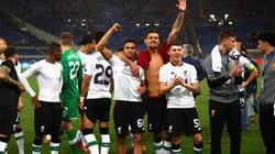 RUMBO A KIEV. Los jugadores de Liverpool felices ante todos su público en Roma (Foto: Getty).