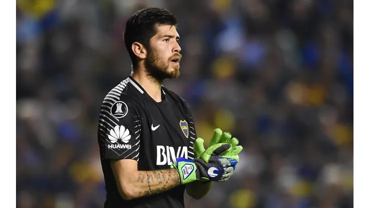 MAL AUGURIO. Rossi adivinó, pero Junior convirtió en el rebote.
