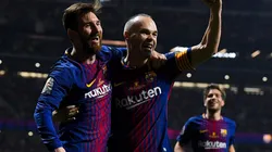 Foto de Andres Iniesta junto a Lionel Messi.