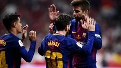 LOS GOLEADORES. Piqué felicita a Messi y Coutinho en la final de la Copa del Rey (Foto: Getty).