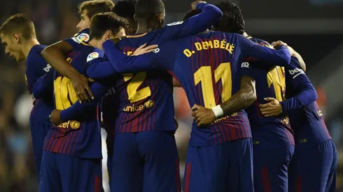 AÚN LÍDERES. Los jugadores del Barcelona celebran el segundo tanto en Balaídos (Foto: Getty).