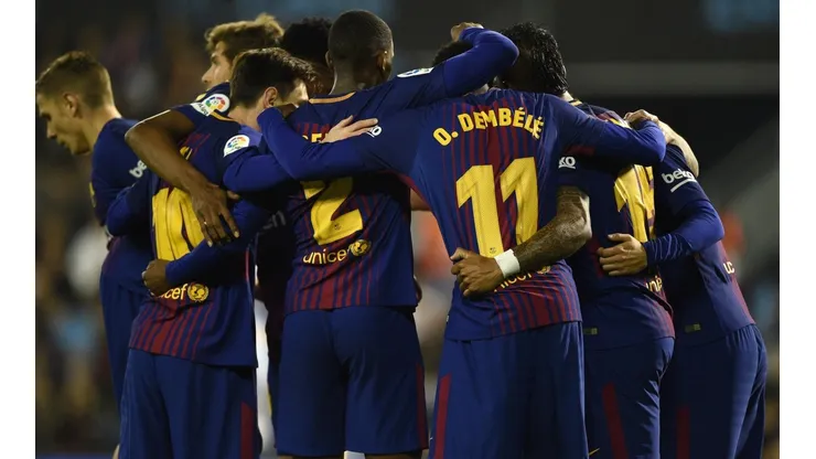 AÚN LÍDERES. Los jugadores del Barcelona celebran el segundo tanto en Balaídos (Foto: Getty).