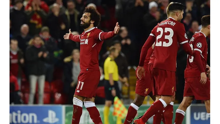 EL GOLEADOR. Salah abre los brazos ante la afición del Liverpool por Champions League.