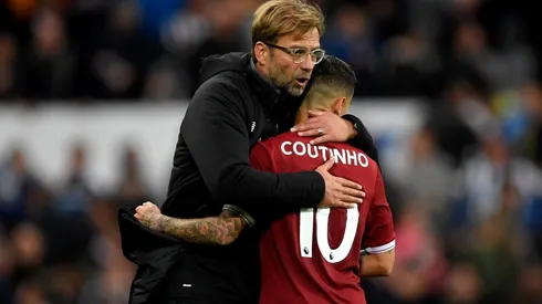 Coutinho y un abrazo con Klopp.