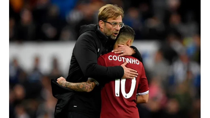 Coutinho y un abrazo con Klopp.