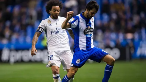 Arribas defiende el balón ante Marcelo.