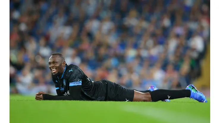 Usain Bolt duante un partido en Londres; el fútbol es su gran pasión