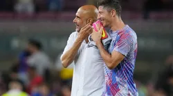 Lewandowski con Guardiola, en el último amistoso entre Barcelona y Manchester City.
