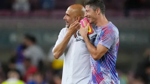Lewandowski con Guardiola, en el último amistoso entre Barcelona y Manchester City.