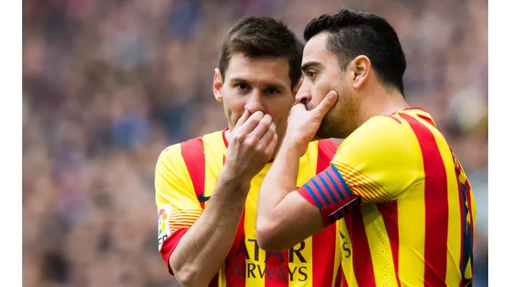 Lionel Messi y Xavi Hernández como compañeros en Barcelona.