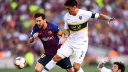 Lionel Messi ante Paolo Goltz y Nahitan Nández (2018).