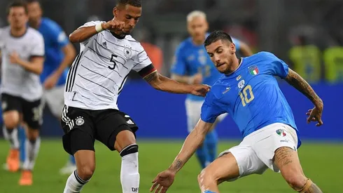 Alemania e Italia en acción de juego.