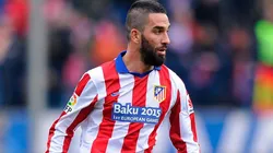 Turan con Atlético de Madrid.