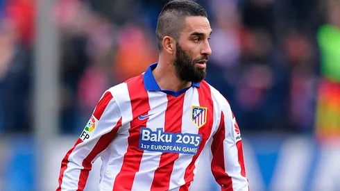 Turan con Atlético de Madrid.