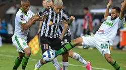 Acción de juego entre Mineiro y América.