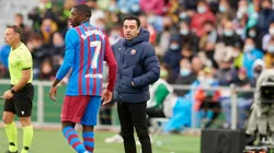 Ousmane Dembelé y Xavi Hernández en un encuentro del Barcelona.