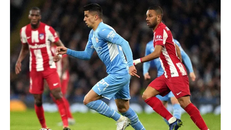 Acción de juego entre Manchester City y Atlético de Madrid.