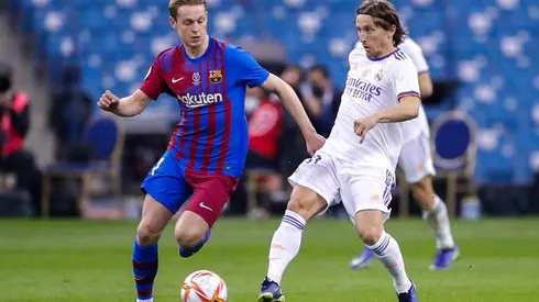 Barcelona y Real Madrid en acción de juego.