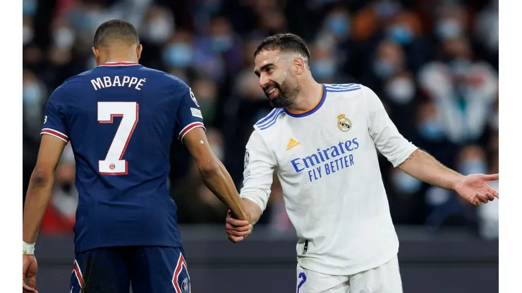Dani Carvajal con Kylian Mbappé.