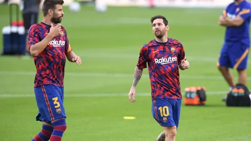 Gerard Piqué y Lionel Messi en un entrenamiento del Barcelona.