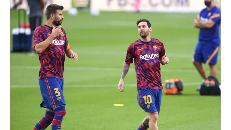 Gerard Piqué y Lionel Messi en un entrenamiento del Barcelona.