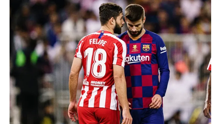 Felipe y Gerard Piqué, jugadores del Atlético de Madrid y Barcelona.
