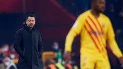 Xavi Hernández y Ousmane Dembelé en un encuentro con Barcelona.