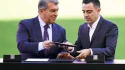 Joan Laporta y Xavi Hernández, presidente y entrenador de Barcelona.