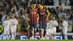 Messi y Xavi como compañeros en 2014.