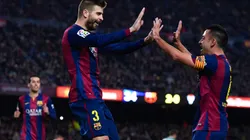 Gerard Piqué y Xavi Hernández en un encuentro con Barcelona.