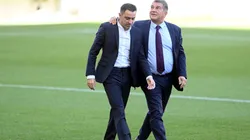 Xavi Hernández y Joan Laporta.