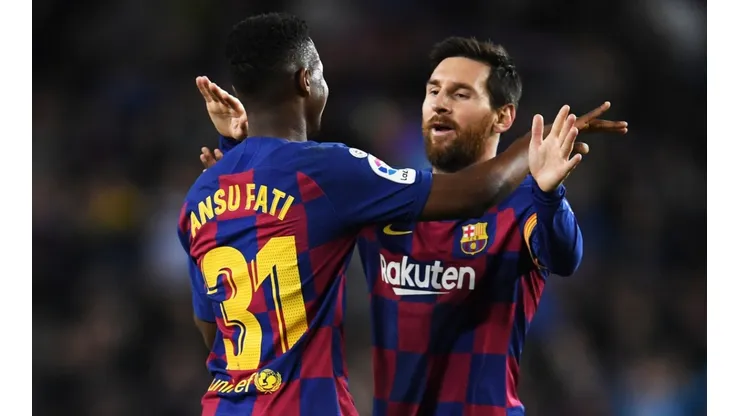 Ansu Fati y Lionel Messi en un encuentro con Barcelona.