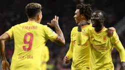 Naby Keita celebrando su golazo con Roberto Firmino.