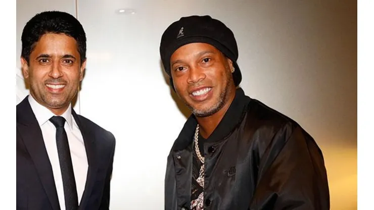 Dinho y el presidente de PSG.