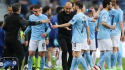 Pep Guardiola y jugadores de Manchester City.