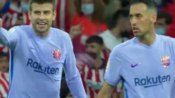 Gerard Piqué y Sergio Busquets, discutiendo por el gol de Atlético de Madrid.