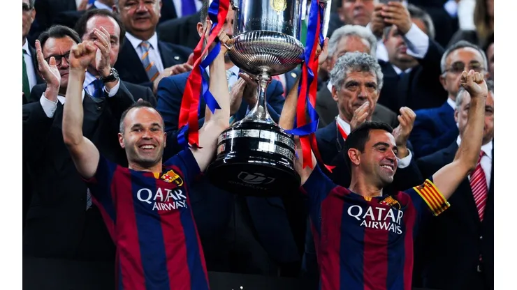 Andrés Iniesta y Xavi Hernández