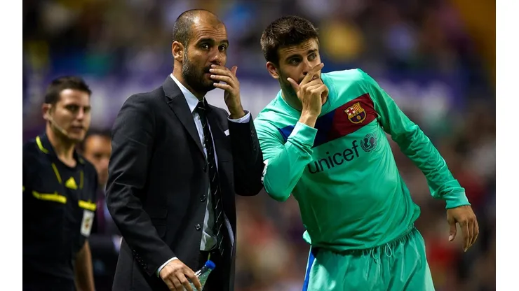 Pep Guardiola y Gerard Piqué en Barcelona en 2011.