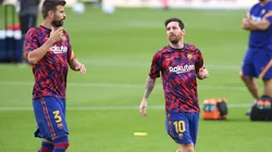 Gerard Piqué y Lionel Messi durante un entrenamiento del Barcelona.