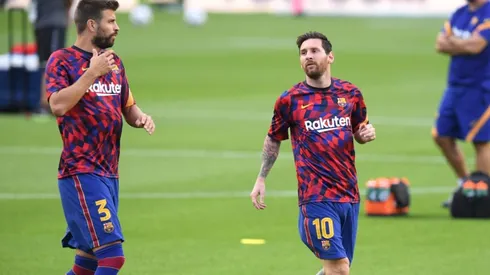 Gerard Piqué y Lionel Messi durante un entrenamiento del Barcelona.